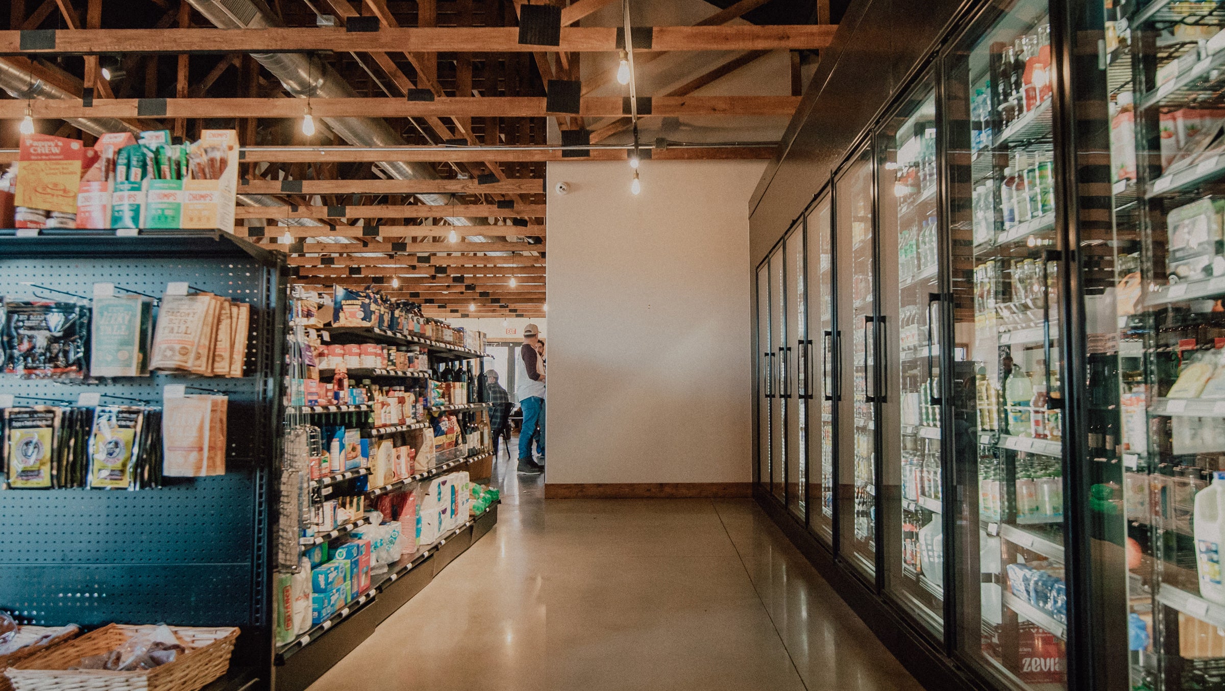 We have plenty of packaged snacks and cold drinks to choose from!